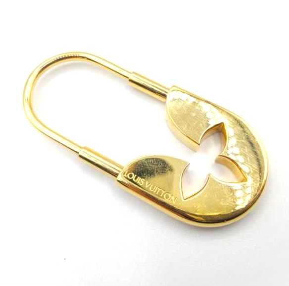 ルイヴィトン買取　ポルトクレクチュールロン　M66009