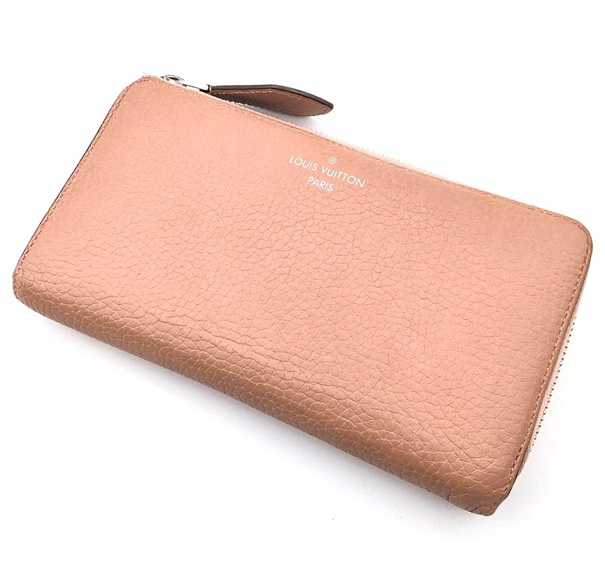 ルイヴィトン買取　ポルトフォイユコメット　トリヨン　M63103