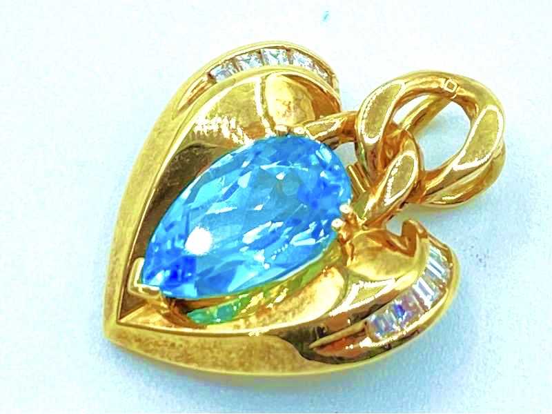 宝石買取 K18イエローゴールド台 ブルートパーズ ダイヤモンド 0.55ct デザイン ペンダント