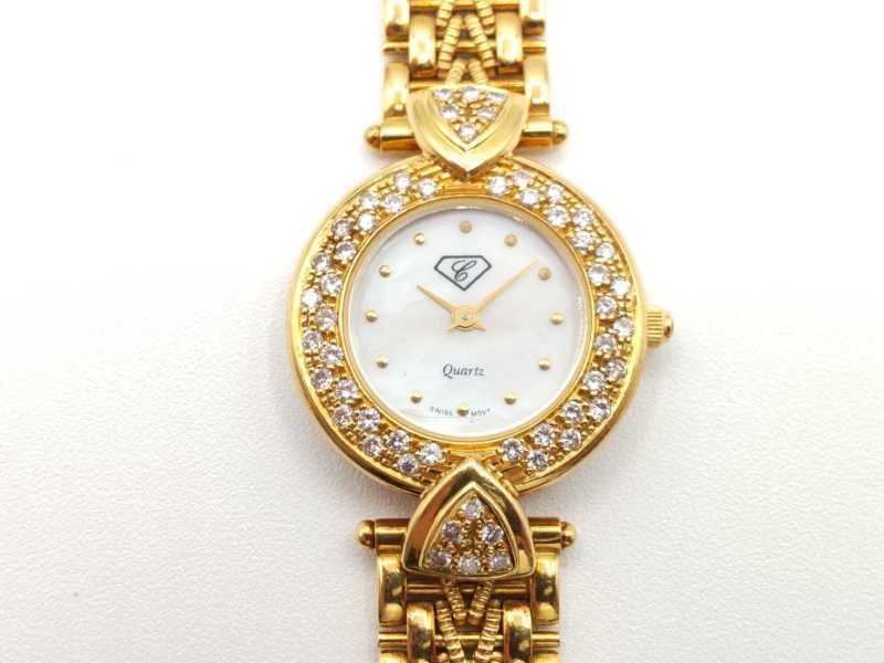 カラチ買取 時計 750